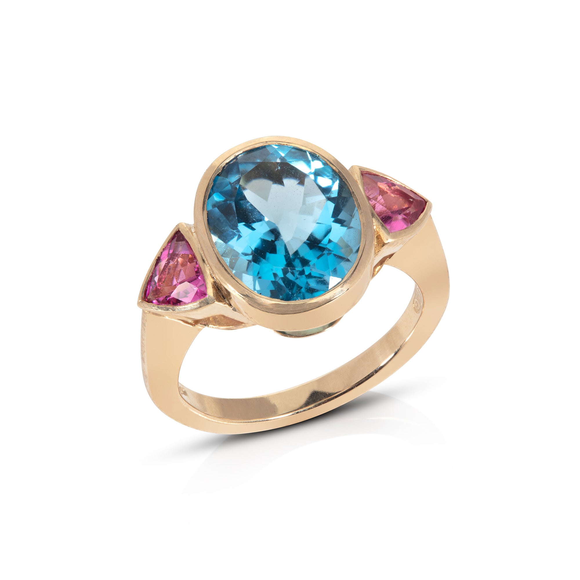 Blue topaz and pink tourmaline ring pictured on white ackground