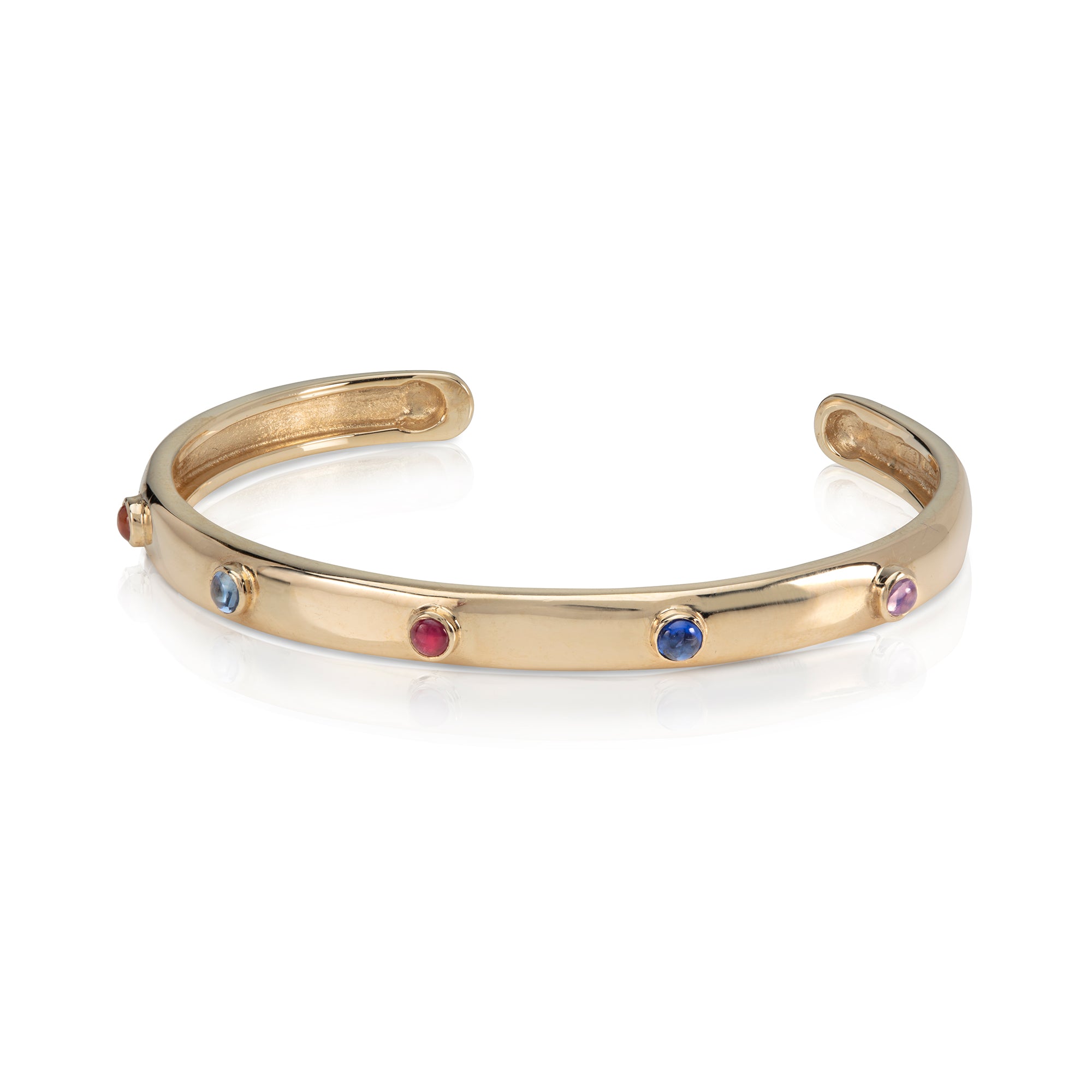 Gold and Sapphire Cabochon Bangle