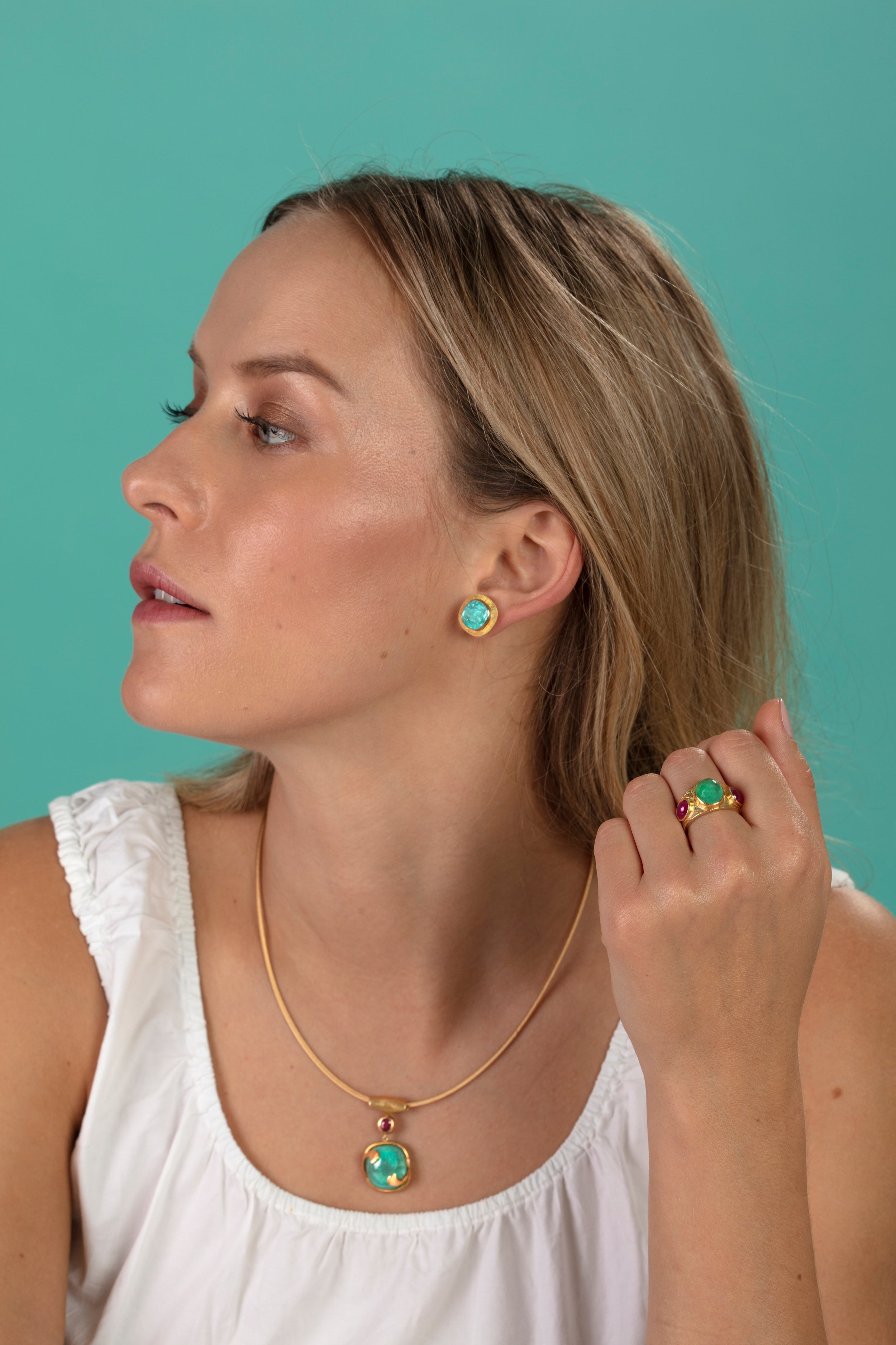 Model pictured wearing Paraiba tourmaline necklace