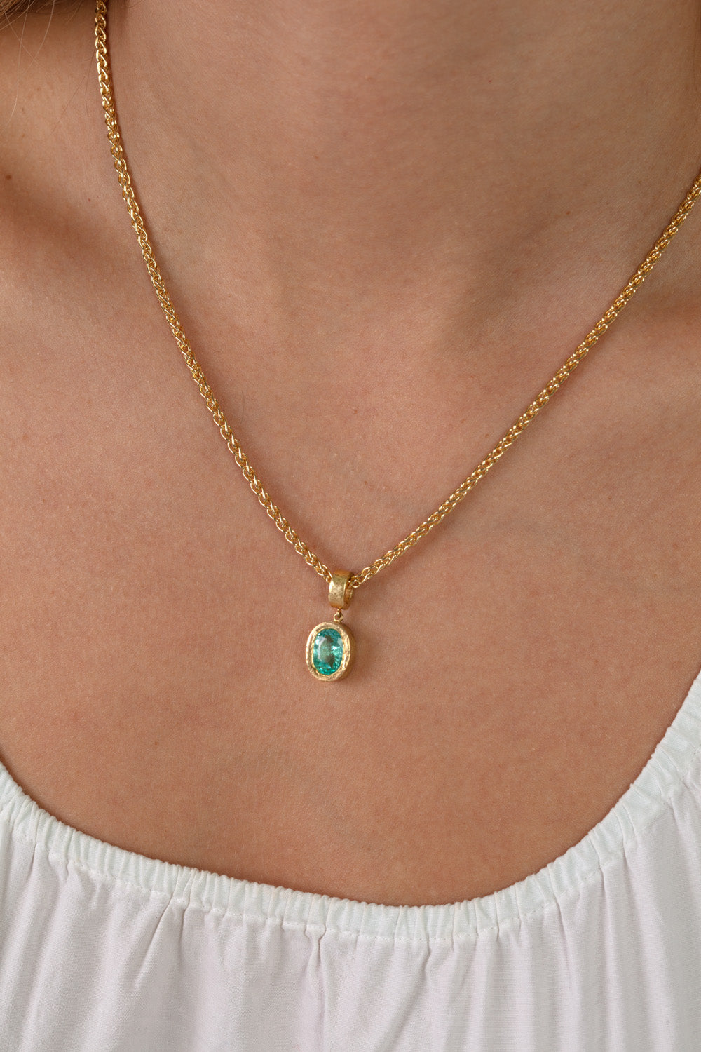 Model wears Paraiba tourmaline necklace