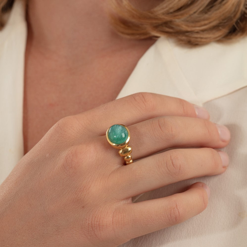 Paraiba tourmaline roman ring pictured on model