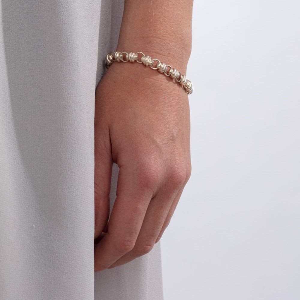 Model pictured wearing silver chunky link bracelet