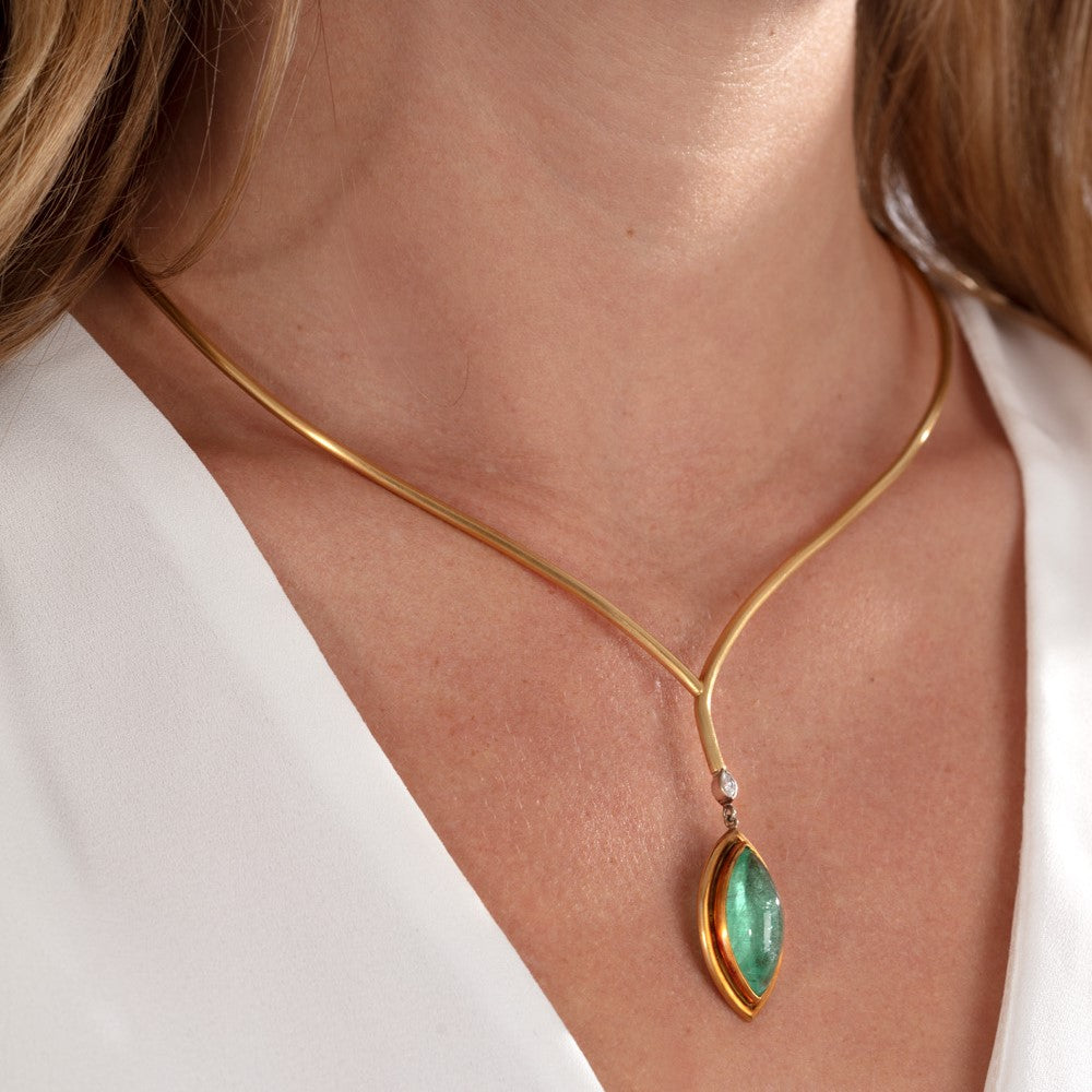 Model wears Paraiba tourmaline cabochon necklace