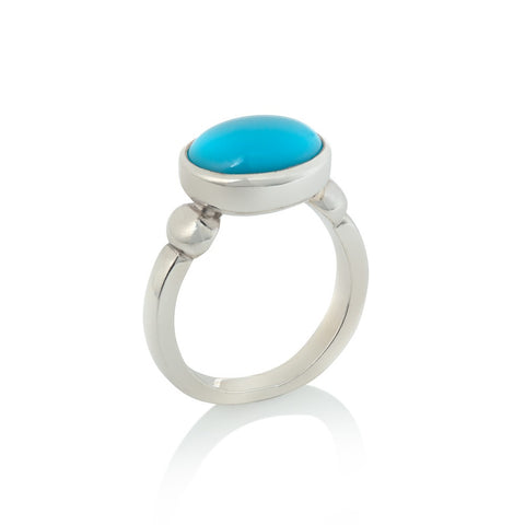 Silver ring set with oval turquoise stone