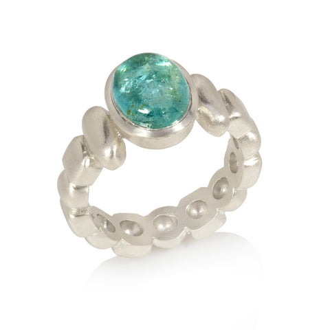Paraiba tourmaline cabochon set in white gold, white gold shank comprises rounded 'bobbles'