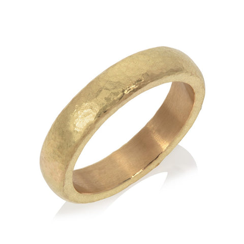 18ct yellow gold beaten stacking ring pictured on white background