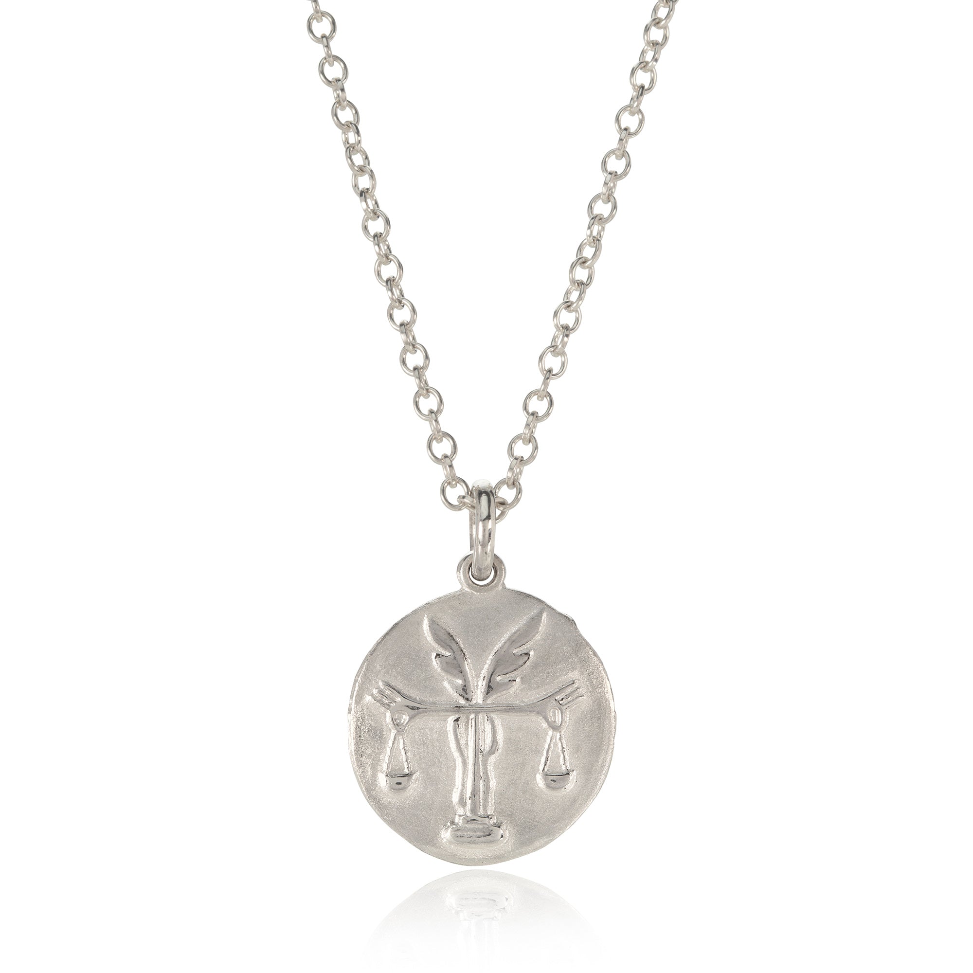 Silver Libra pendant pictured on white background