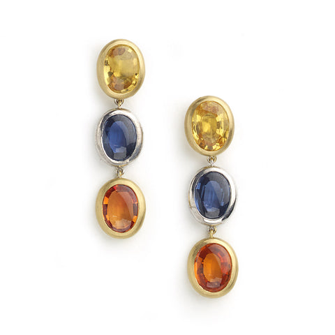 Yellow and white gold drop earrings set with three oval table top sapphires in yellow, blue and orange
