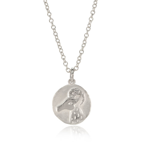 Silver Aries Pendant photographed on a white background