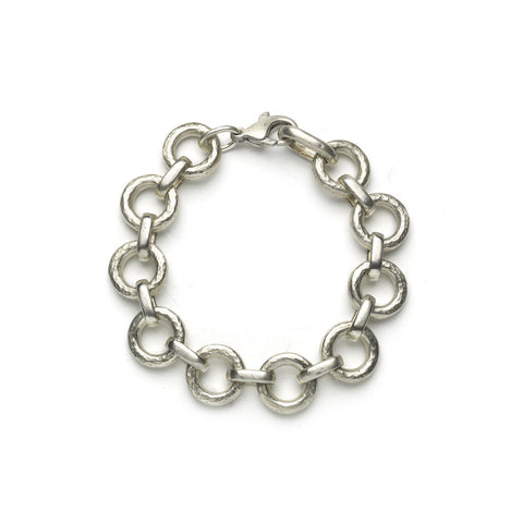 Silver bracelet with beaten round links alternately linked with smooth oval links