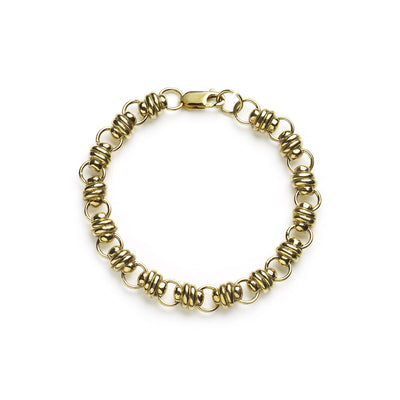 Yellow gold bracelet with chunky links on white background