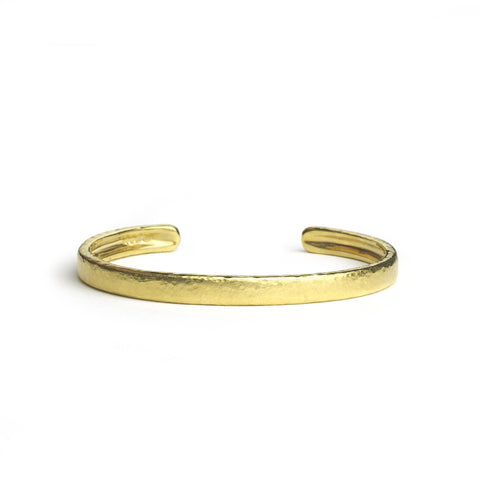 Silver and yellow gold micro-plated bangle with hammered texture finish, on a white backgrund