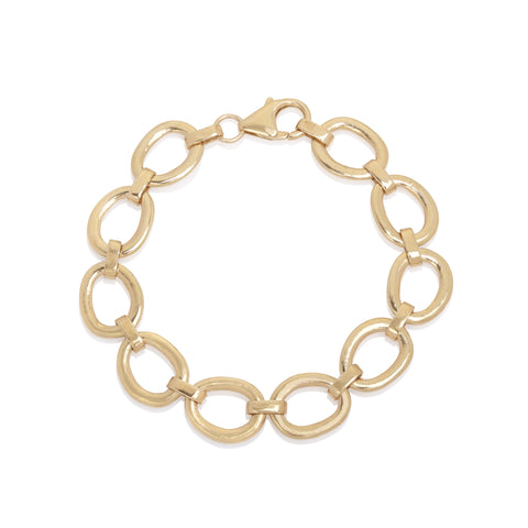 Yellow gold link bracelet on white background