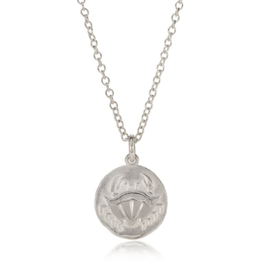 Silver cancer pendant pictured on white background