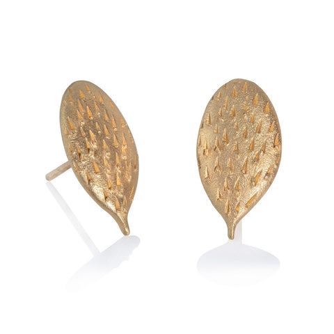 Gold textured stud earrings in cactus form on white background