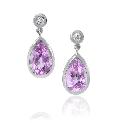 Pear shaped kunzite drops, set in white gold, with diamond stud tops