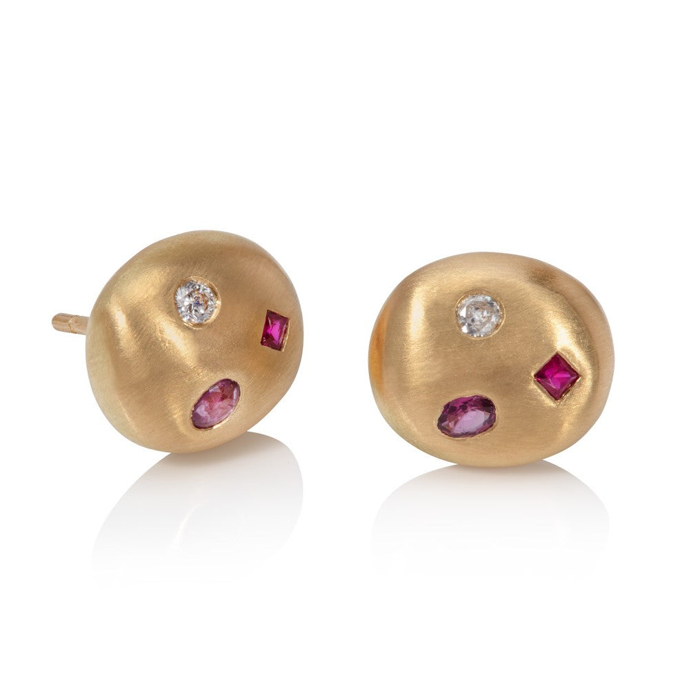 18ct yellow gold earrings with rubies and diamonds on white background