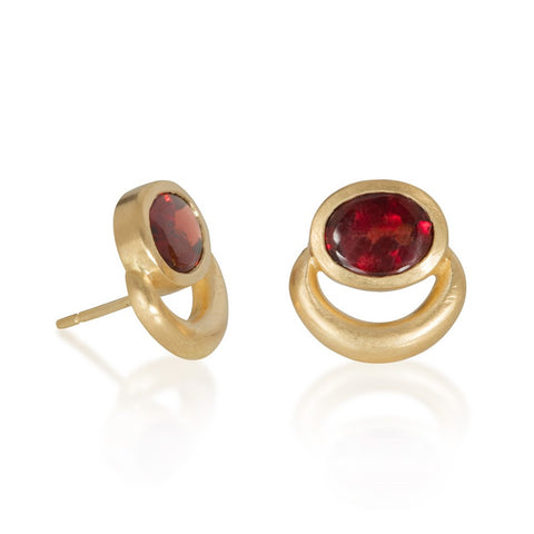 Stud earrings in signature JLG 'bull nose' style with table top garnets, set in yellow gold
