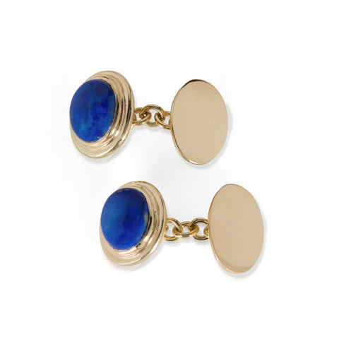 Yellow gold cufflinks with chain link fitting set with lapis lazuli on white background