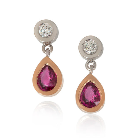 Round diamonds set in white gold, with pear shaped ruby drops set in red gold
