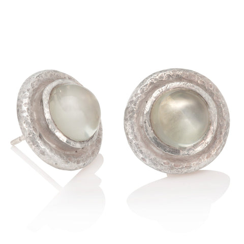 Green moonstone and silver stud earrings on a white background