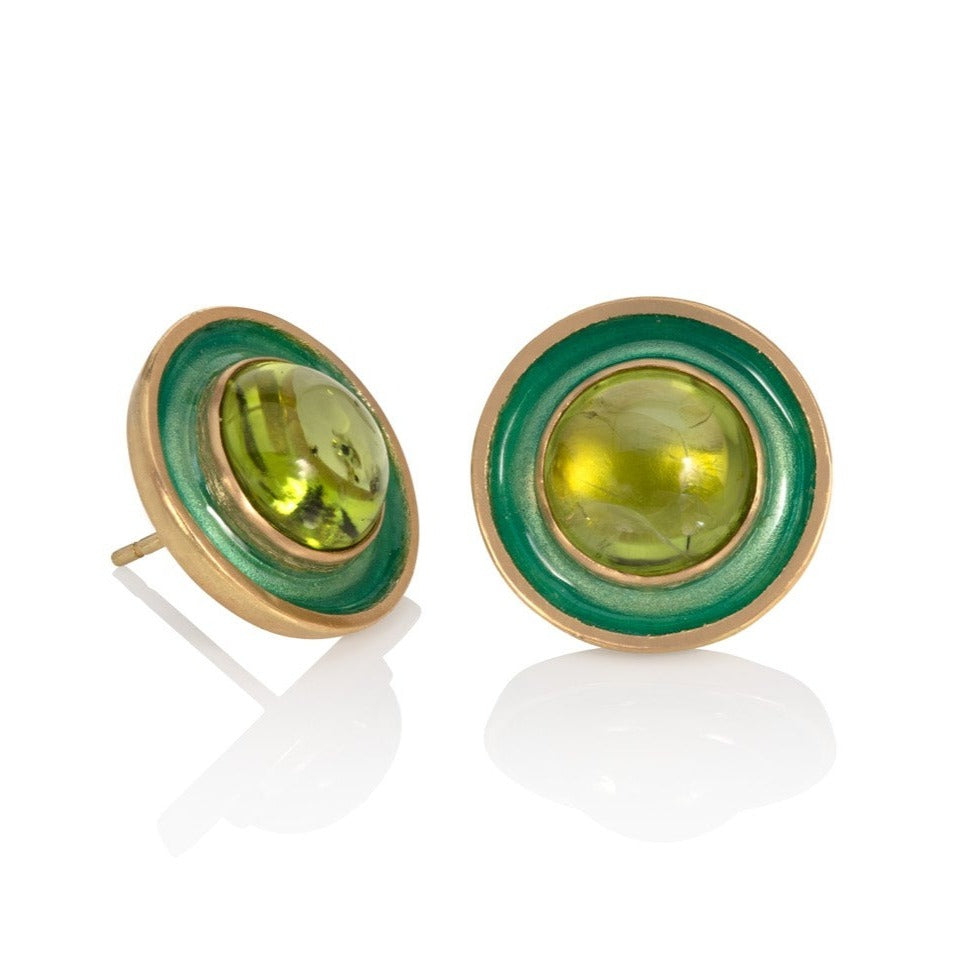 Green peridot and gold stud earrings on a white background