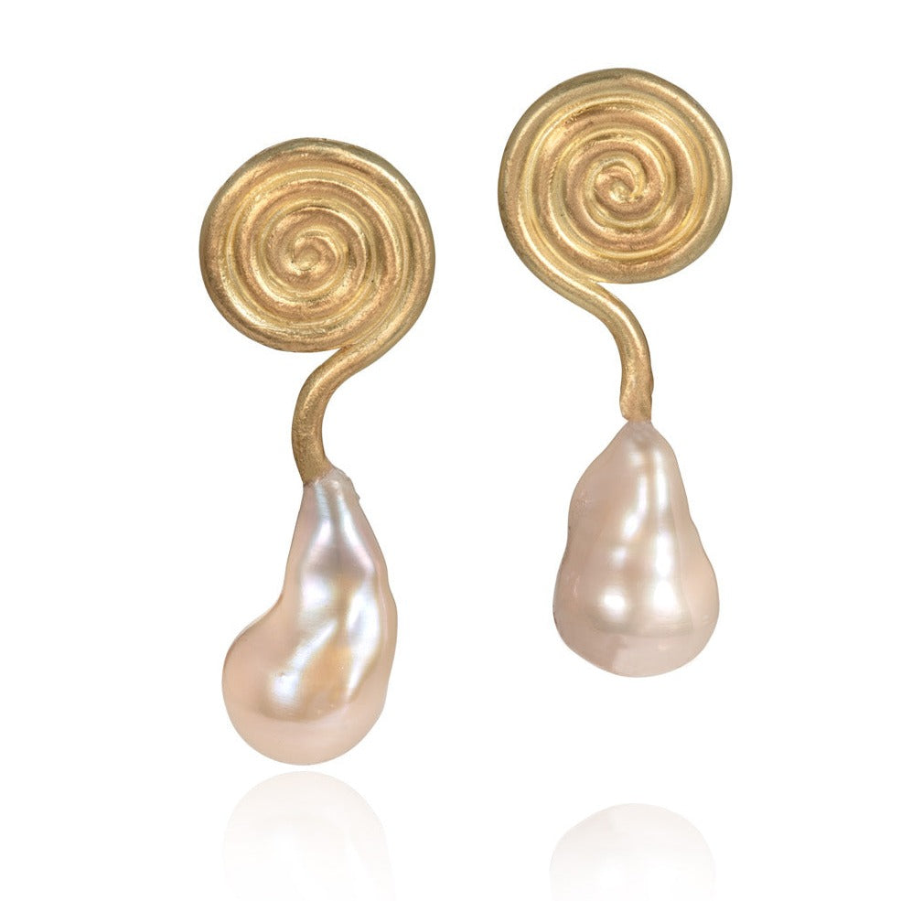 Yellow gold and pearl drop earrings shown on a white background
