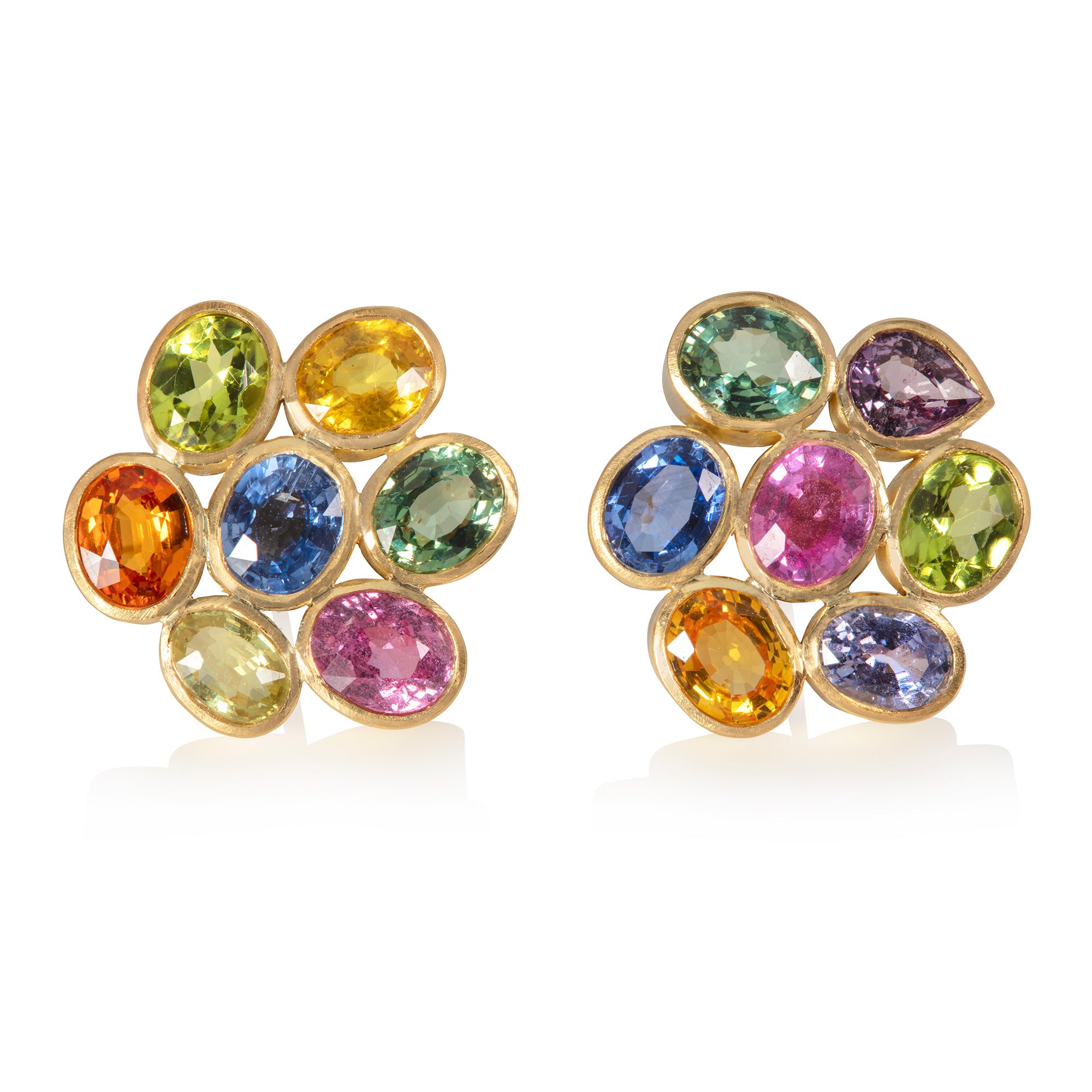 Multi-coloured sapphire earrings on a white background