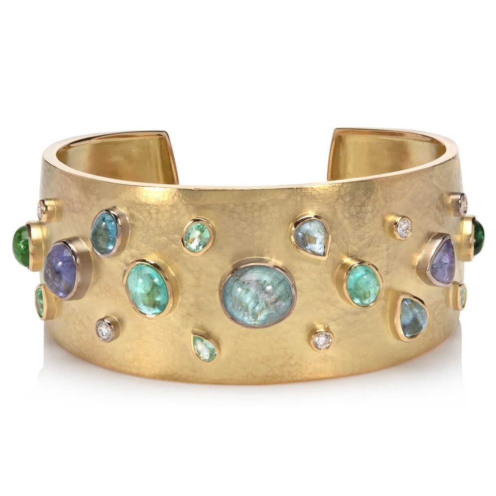 18ct yellow gold cuff bangle set with paraiba tourmalines and diamonds head-on angle, on white background