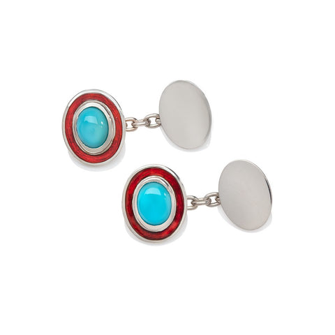 Silver cufflinks set with turquoise with red enamel borders on white background