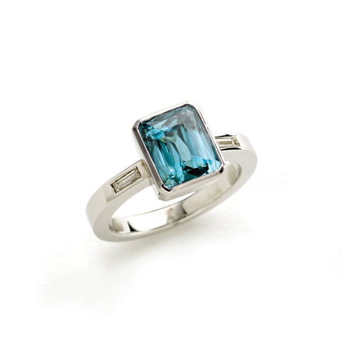 Blue topaz and Pink Tourmaline Three Stone Ring in Yellow Gold