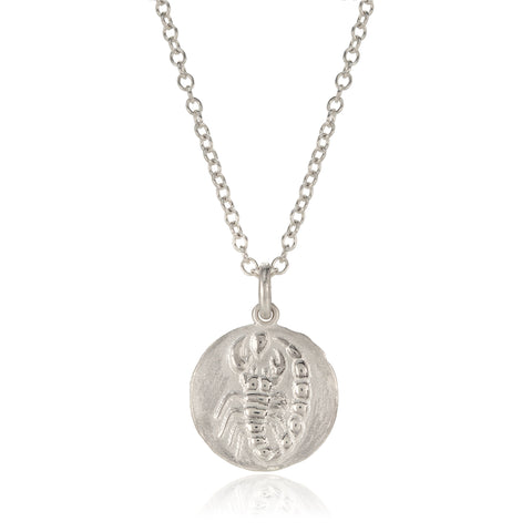 Silver scorpio pendant pictured on white background