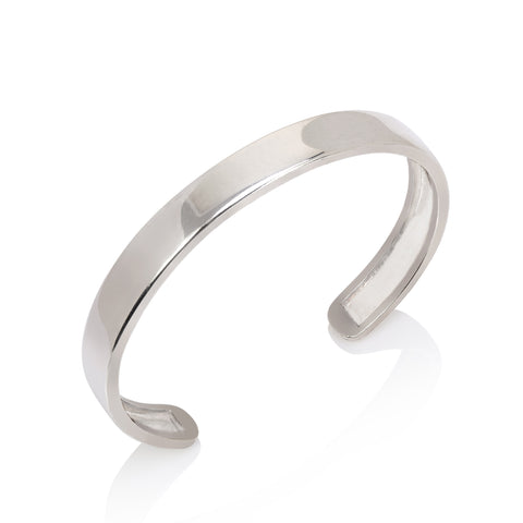 Wide silver bangle with high polish finish on white background