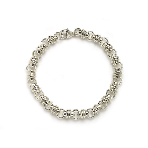 Silver bracelet with thick links interspersed with small round links on white background